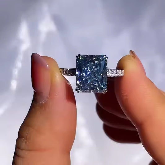 Luxury Radiant Cut London Blue Topaz Wedding Band β A Unique Statement Piece