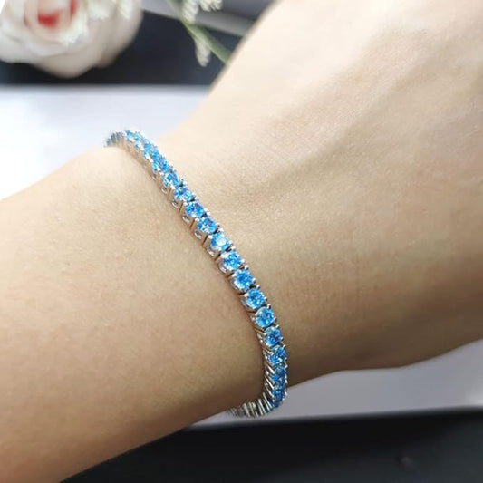 Luxurious Swiss Blue Topaz Bracelet – Timeless Round Cut Design