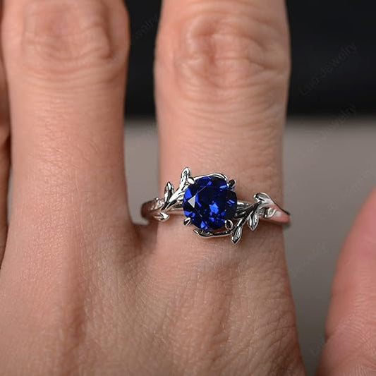 Midnight Bloom: Round Blue Sapphire Leaf Engagement Ring