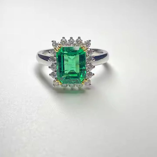 Glamorous Emerald-Cut Green Emerald Ring – White Gold Plated Finish